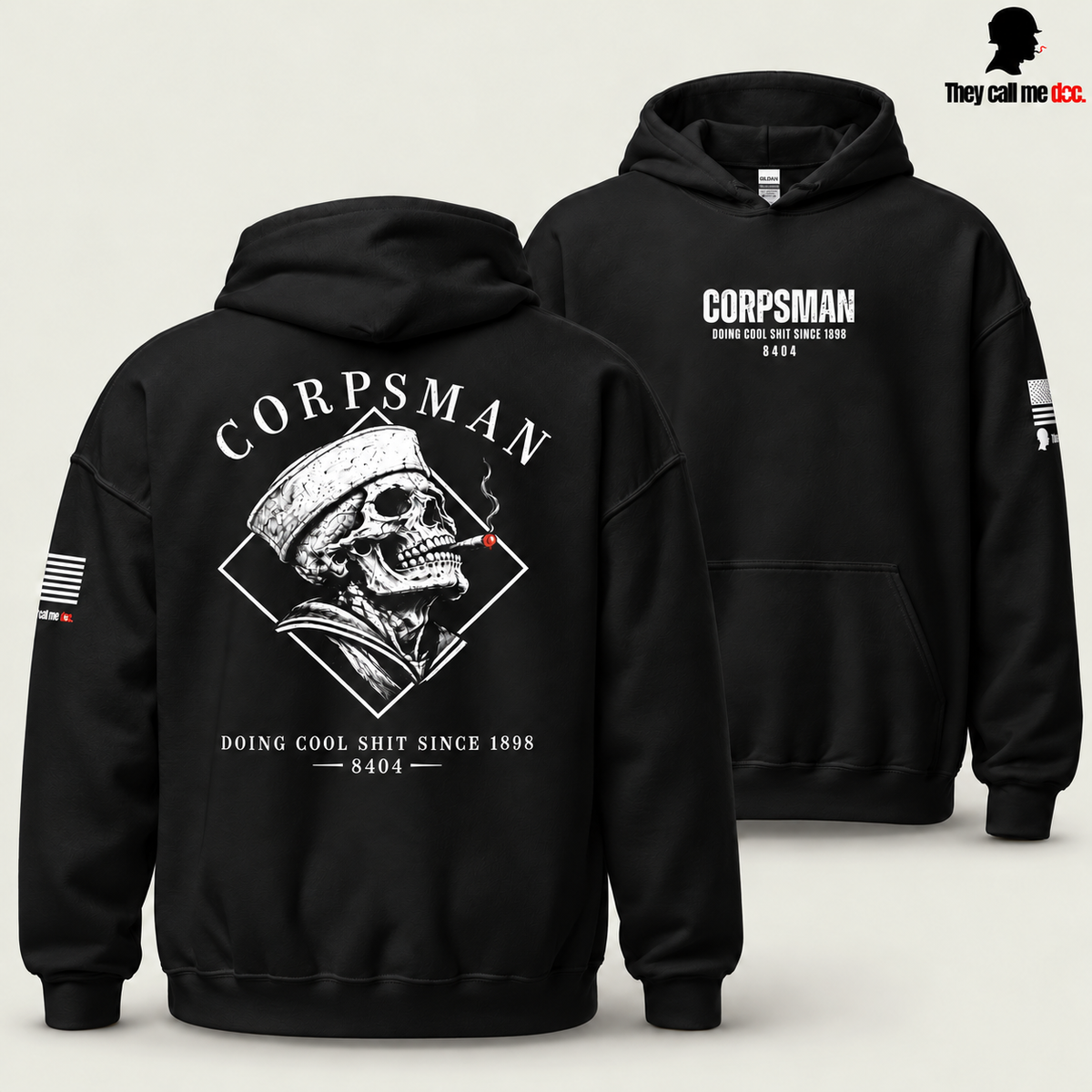 Corpsman 8404 Hoodie in black — back skull design in foreground with centered front chest print behind