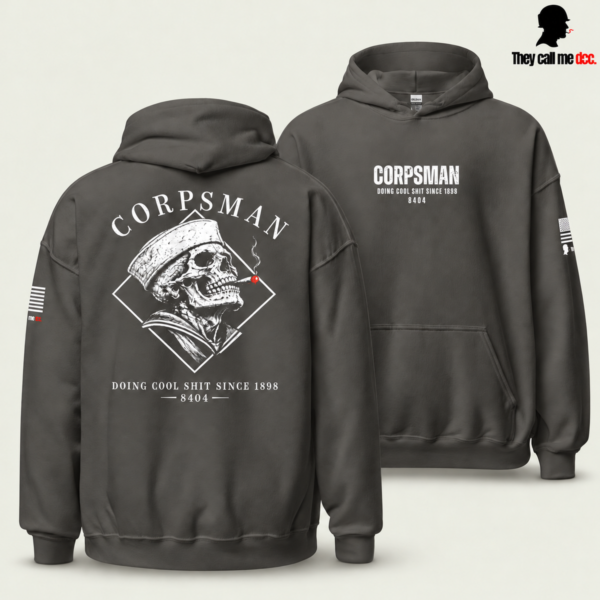 Corpsman 8404 Hoodie in charcoal — back skull design in foreground with centered front chest print behind
