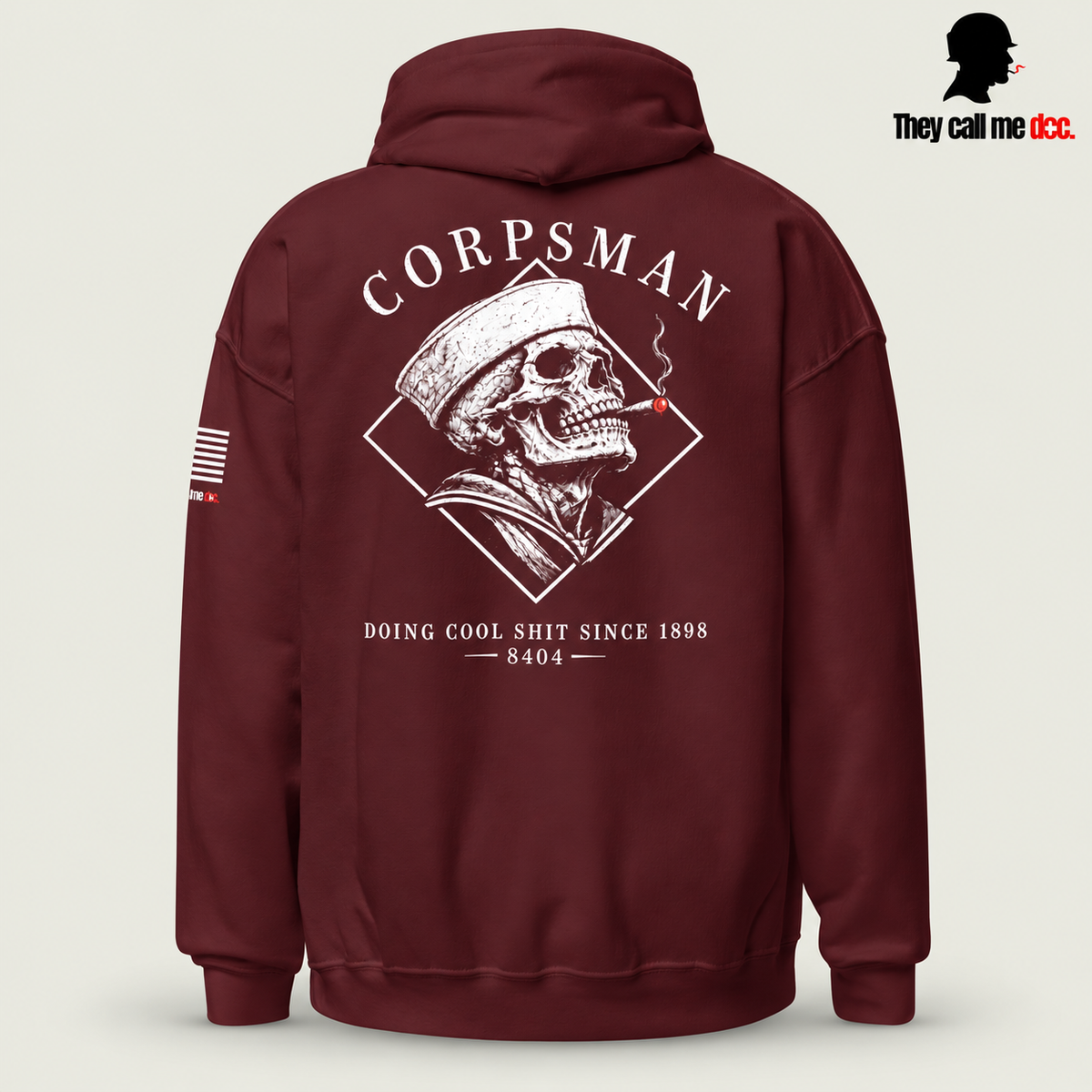 Corpsman 8404 Hoodie in maroon — back view with cigar-smoking skull and Doing Cool Shit Since 1898 graphic