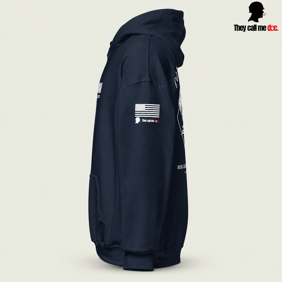 Corpsman 8404 Hoodie in navy — left sleeve view with American flag and They Call Me Doc logo